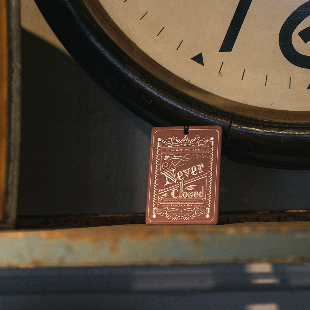 Sorry We're Never Closed Air Freshener Rose in a Hat