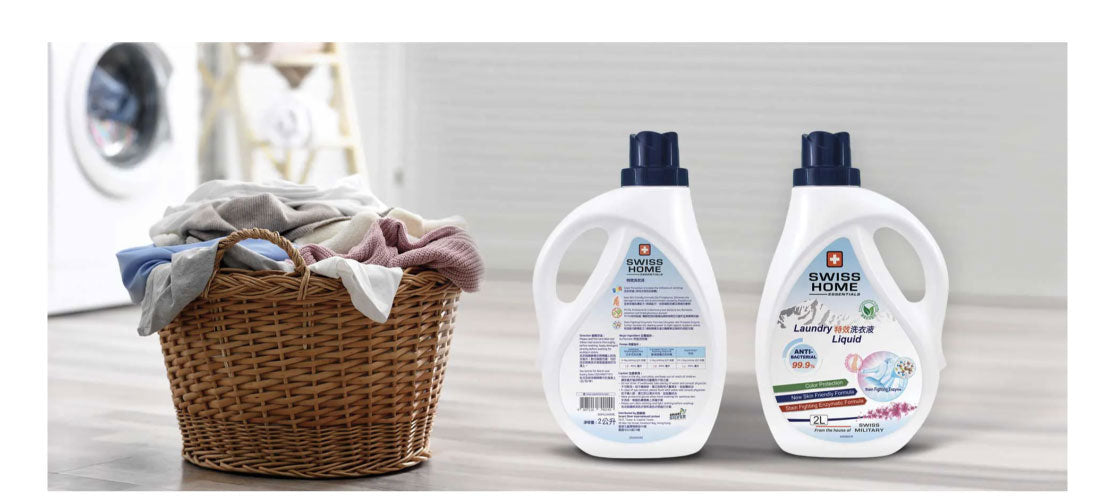 clothes in laundry basket with Spot On laundry liquid next to it. 